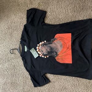 Black Graphic Tee with Orange Design